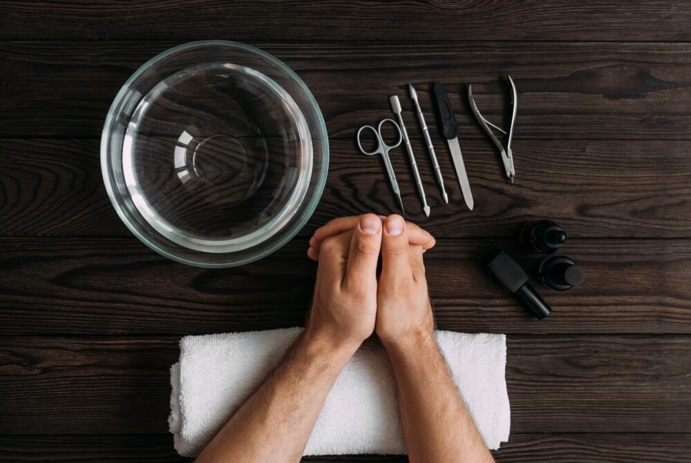 Man's manicure. Men's hands prepared to manicure. Nail care of the hands